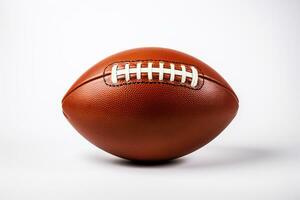 An inflated football ready to be kicked symbolizing the start of a new football season placed on a white background photo