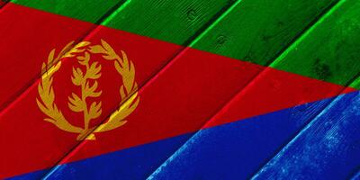 Flag of State of Eritrea on a textured background. Concept collage. photo