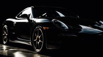 Close up front view of black sports car with copy space. photo