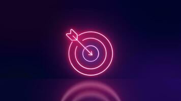 Arrow target luminous neon on purple background. Dart hitting business concept. photo