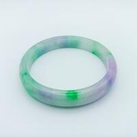 Light green And Purple Color Combination Jade Bracelet Isolated On White Background. Square Orientation photo