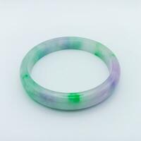 Light green And Purple Color Combination Jade Bracelet Isolated On White Background. Square Orientation photo