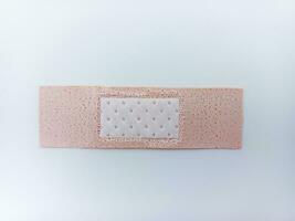 Small Size Adhesive Bandage Isolated On White Background. Inside View photo