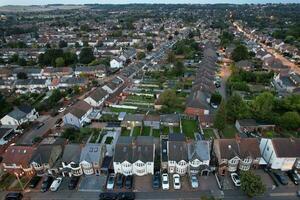 Aerial View of Illuminated Luton's  Residential Homes of England UK after Sunset During Night of Summer. Footage Was Captured with Drone's Camera on Sep 2nd, 2023 photo