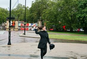 Beautiful Low Angle Image of People at Central London capital City of England Great Britain, Most of the Tourist are International from Many Communities of World. Image Captured on August 2nd, 2023 photo