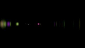 Multicolored optical flare shine light ray move from left to right video