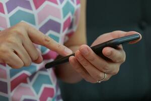Using phone, mobile phone in hand photo