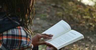 Young Man Reading Outside Healthy Mental Activity Work Life Balance video