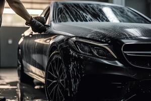 Car washing series Cleaning the car with high pressure water. photo
