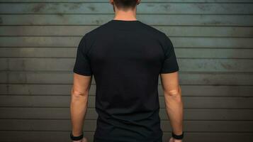 Generative AI, Realistic black T-Shirt mock up blank put on young man, back view, copyspace for presentation advertising. Blank business concept. photo