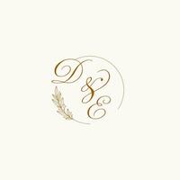 Initials DE wedding monogram logo with leaves and elegant circular lines vector