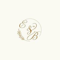 Initials EB wedding monogram logo with leaves and elegant circular lines vector