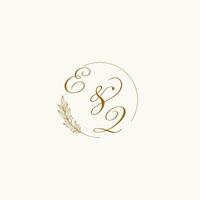 Initials EQ wedding monogram logo with leaves and elegant circular lines vector