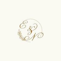 Initials EN wedding monogram logo with leaves and elegant circular lines vector