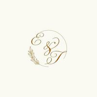 Initials ET wedding monogram logo with leaves and elegant circular lines vector