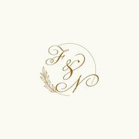 Initials FN wedding monogram logo with leaves and elegant circular lines vector