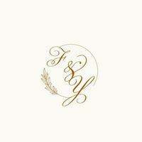 Initials FY wedding monogram logo with leaves and elegant circular lines vector