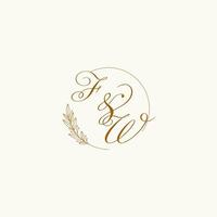 Initials FW wedding monogram logo with leaves and elegant circular lines vector