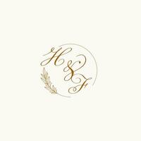 Initials HF wedding monogram logo with leaves and elegant circular lines vector