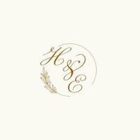 Initials HE wedding monogram logo with leaves and elegant circular lines vector