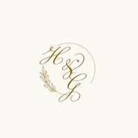 Initials HG wedding monogram logo with leaves and elegant circular lines vector