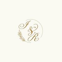 Initials IR wedding monogram logo with leaves and elegant circular lines vector