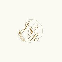 Initials JR wedding monogram logo with leaves and elegant circular lines vector