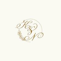 Initials KN wedding monogram logo with leaves and elegant circular lines vector