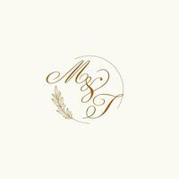 Initials MT wedding monogram logo with leaves and elegant circular lines vector