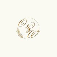 Initials OW wedding monogram logo with leaves and elegant circular lines vector