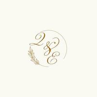 Initials QE wedding monogram logo with leaves and elegant circular lines vector