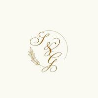 Initials SG wedding monogram logo with leaves and elegant circular lines vector