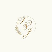 Initials TJ wedding monogram logo with leaves and elegant circular lines vector