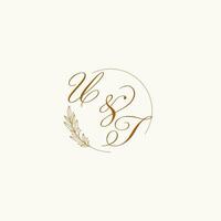 Initials UT wedding monogram logo with leaves and elegant circular lines vector