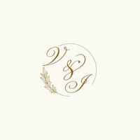 Initials VI wedding monogram logo with leaves and elegant circular lines vector