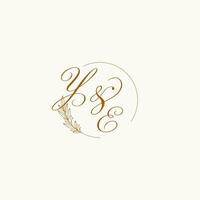 Initials YE wedding monogram logo with leaves and elegant circular lines vector