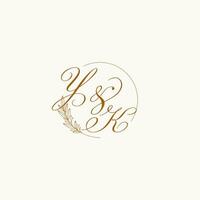 Initials YK wedding monogram logo with leaves and elegant circular lines vector