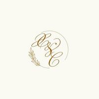 Initials XC wedding monogram logo with leaves and elegant circular lines vector