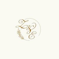 Initials ZE wedding monogram logo with leaves and elegant circular lines vector