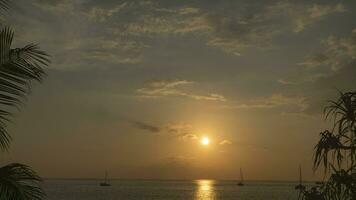 Beautiful sunset on the sea. Coast of a tropical island. Timelapse, evening on the beach video