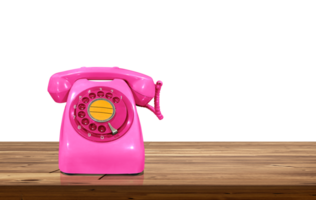 Old style pink desk phone on wooden table isolated PNG transparent