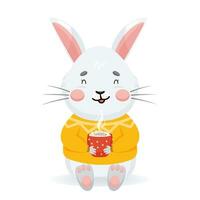 Cute gray rabbit sits and holds a cup of cocoa in its paws. A bunny in a warm sweater is holding a hot drink vector