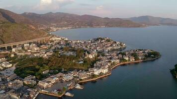 Village and lake in Shuanglang, Yunnan, China. video