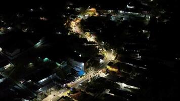 Aerial view of traffic flow at night. The sky was dark as traffic flowed down the highway video