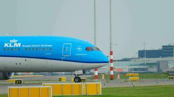 AMSTERDAM, THE NETHERLANDS JULY 25, 2017 - KLM Royal Dutch Airlines Dreamliner Boeing 787 PH BHI taxiing before departure at runway 36L Polderbaan. Shiphol Airport, Amsterdam, Holland video