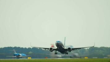 AMSTERDAM, THE NETHERLANDS JULY 25, 2017 - KLM Royal Dutch Airlines Boeing 737 PH BXA in retro livery departure at runway 24 Kaagbaan. Shiphol Airport, Amsterdam, Holland video