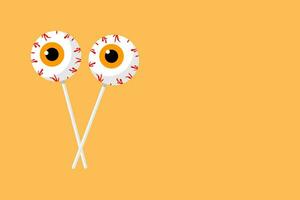 Halloween lollipop eye human on a white stick with orange background.  Copy space. vector