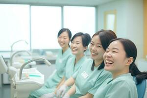 Women nursing assistant are completing an exam in an exam room photo