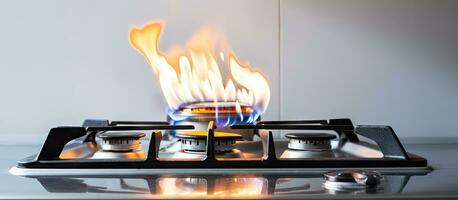white gas stove with fire photo