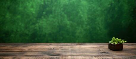 Wooden table against green backdrop photo